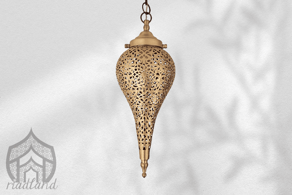 Compact-golden-hanging-lamp-perfect-for-adding-a-touch-of-luxury-to-smaller-spaces-like-a-hallway-or-toilet