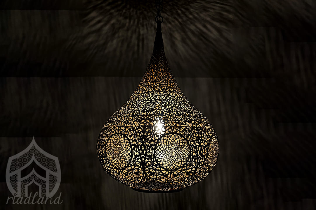 Large-hanging-lamp-shining-in-the-dark-perfect-for-adding-luxury-to-the-living-room-or-kitchen