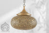 Golden copper lamp with a semi-spherical design, adding elegance to any space